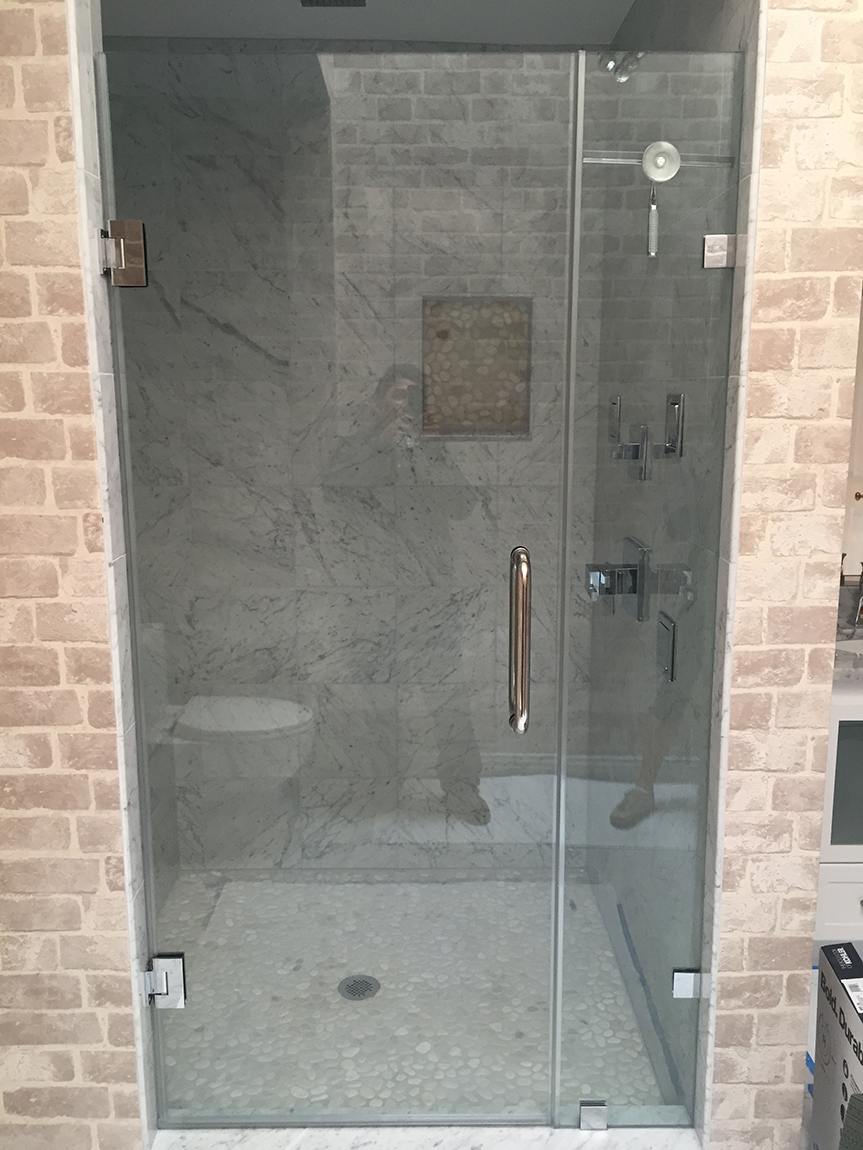 Custom frameless shower enclosure installation by Design Glass & Mirror - example 2