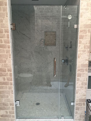 Custom frameless shower enclosure installation by Design Glass & Mirror - example 2
