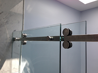 Custom frameless shower enclosure installation by Design Glass & Mirror - example 5