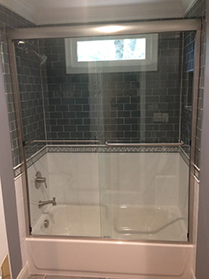 Custom frameless shower enclosure installation by Design Glass & Mirror - example 6