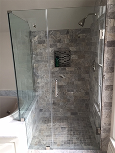 Custom frameless shower enclosure installation by Design Glass & Mirror - example 7